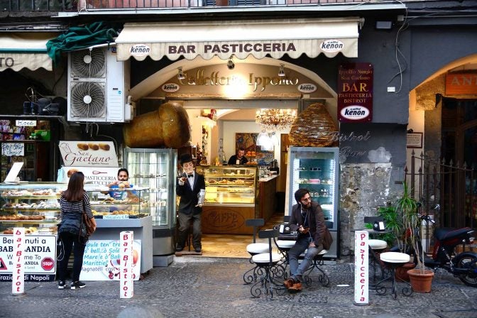 people drinking coffee in Italy at bar cafe